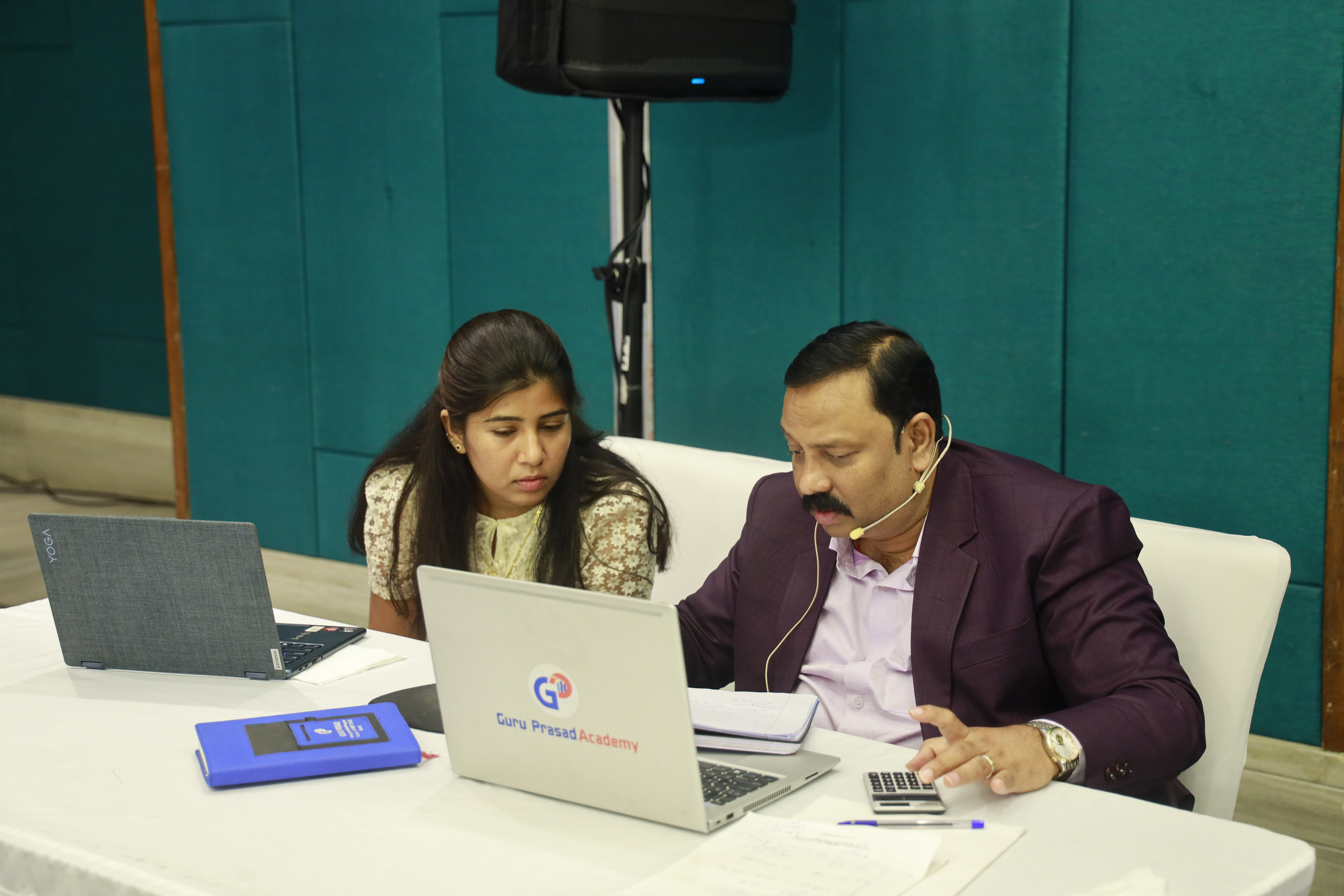 Shri Guru Prasad guiding a participant during Event 34